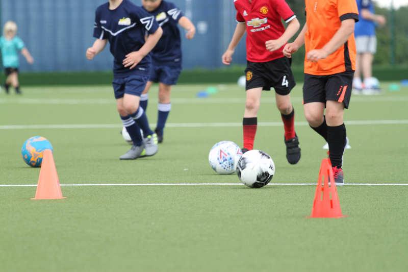 A football drill being played