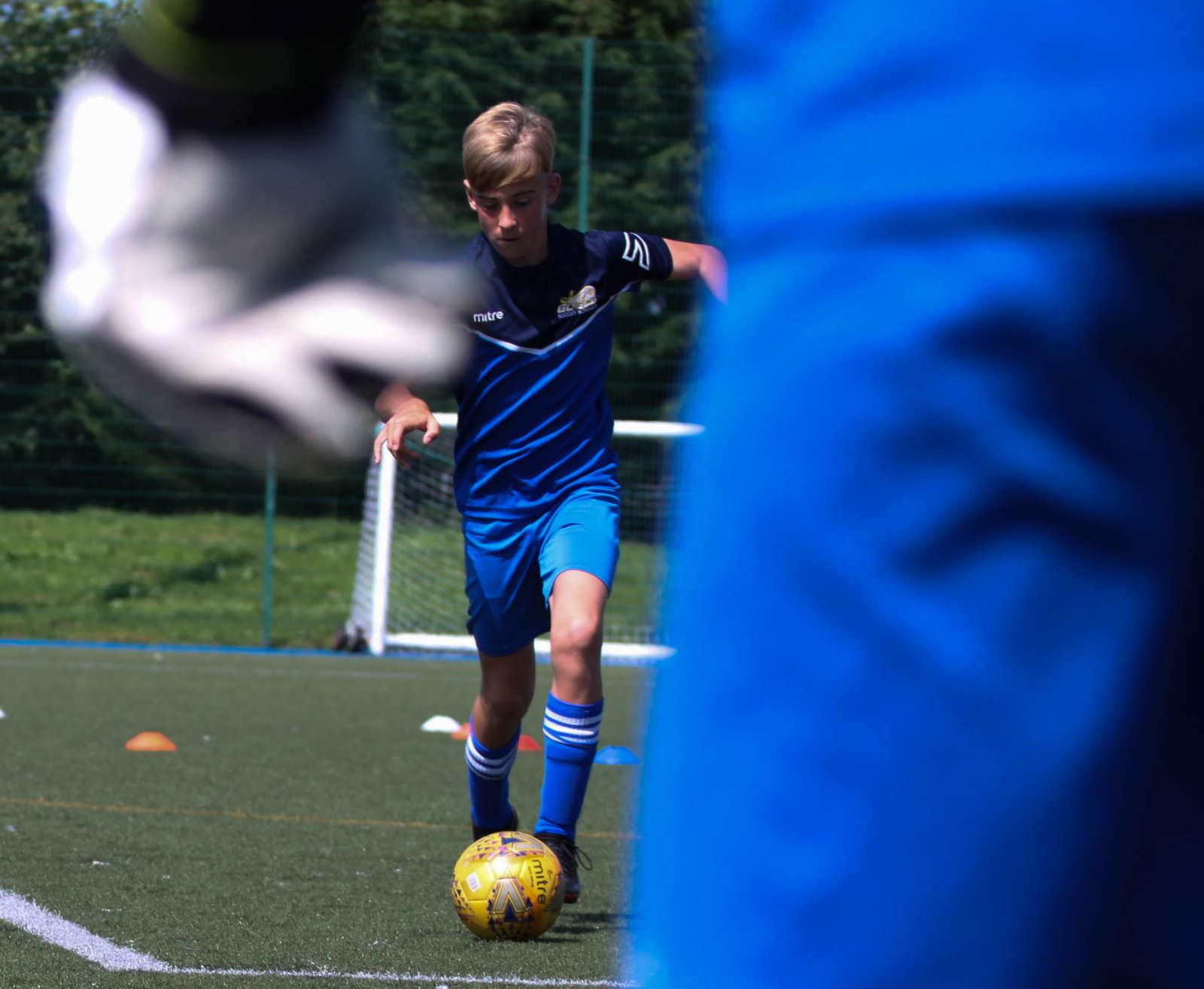 20210717-07-33-a An attacker approaching a goalkeeper